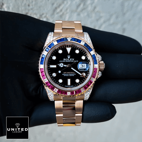 Rolex GMT-Master II 126755SARU  rose gold color and a gem bezel in red and blue