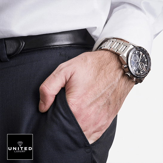 Tag Heuer Carrera Caliber Heuer 01 Stainless Steel Black Dial  man in a suit on his wrist