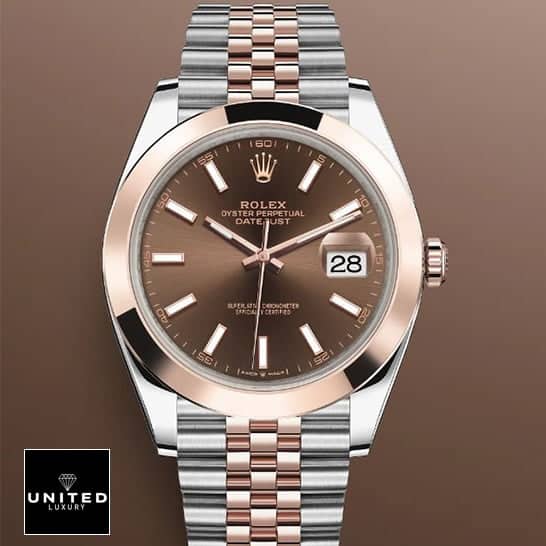 Rolex datejust everose gold  jubilee bracelet and brown background